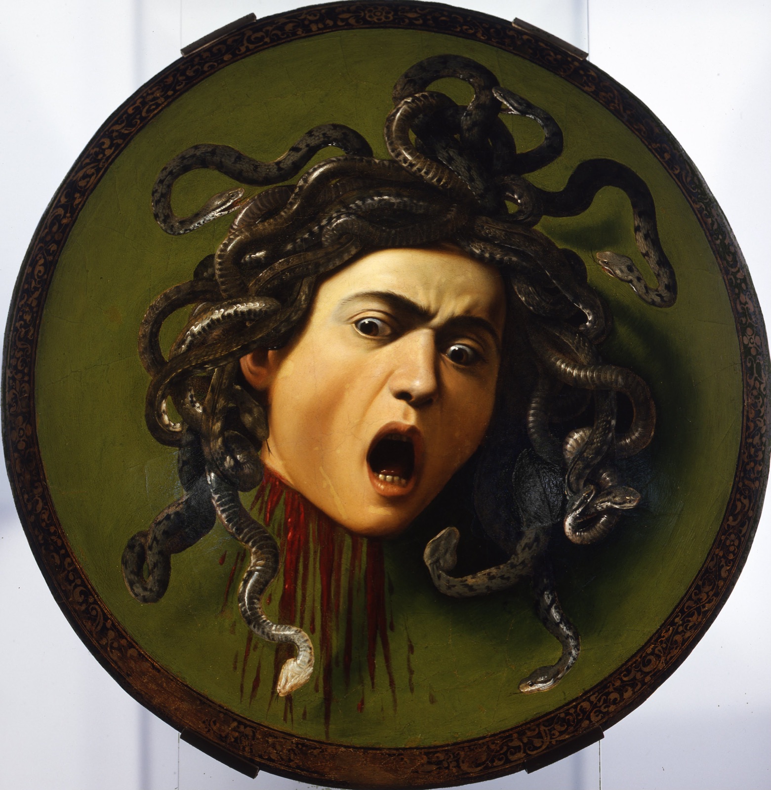 卡拉瓦乔《美杜莎》(约1597,木盾油画) · 佛罗伦萨乌菲兹美术馆藏 · 图源 Wikimedia Commons